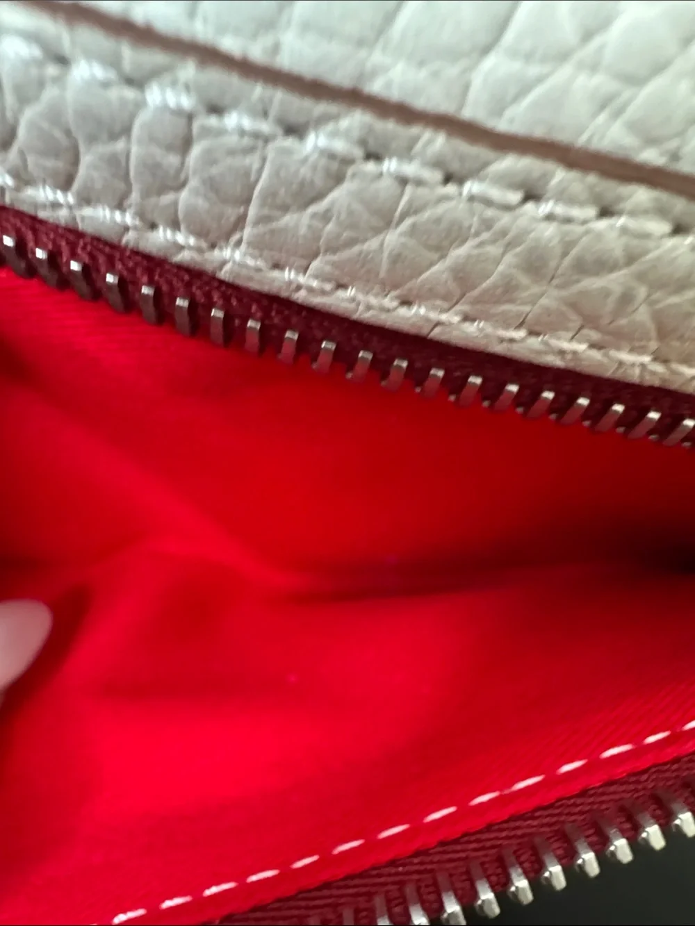 Dooney & Bourke White Pebbled Leather Wristlet with Tan Trim